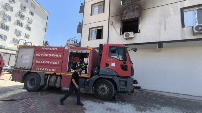 Mardin'de apartman dairesinde &ccedil;ıkan yangında 3 kişi dumandan etkilendi